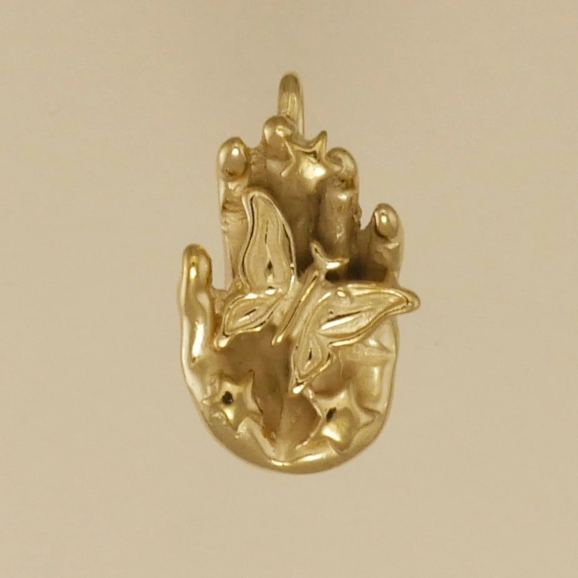 Butterfly In Hand Pendant