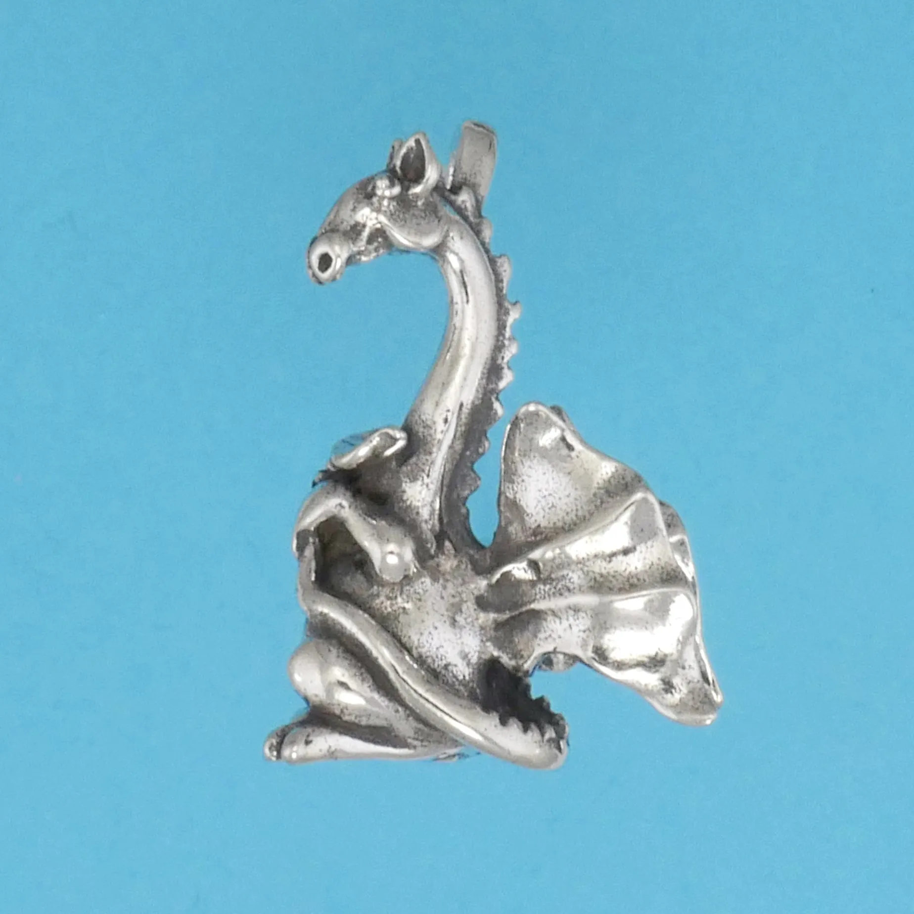 Reticent Dragon Pendant